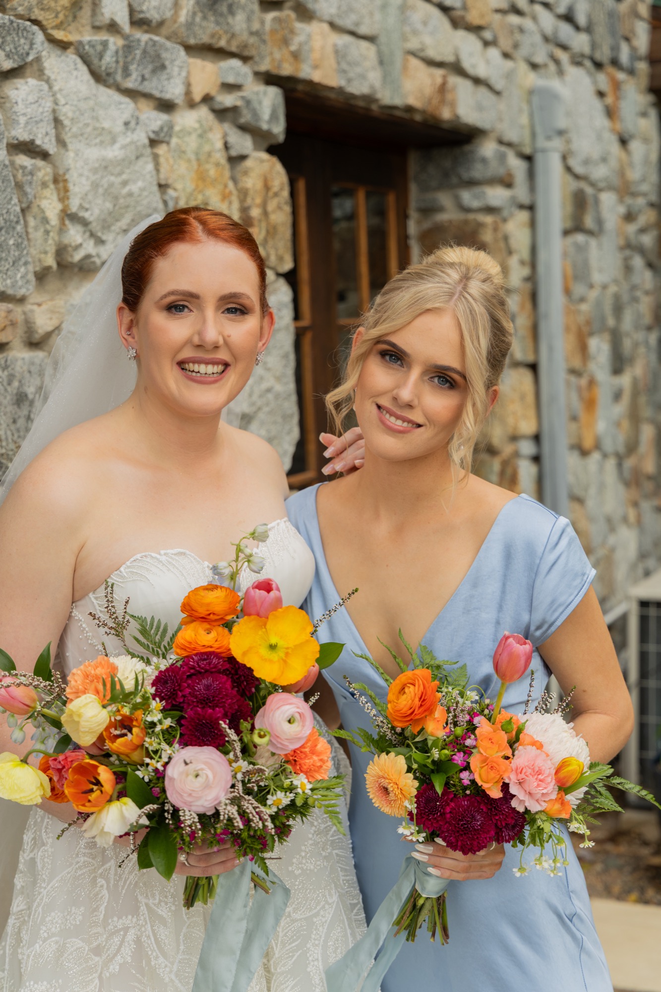 Bride and bridesmaid